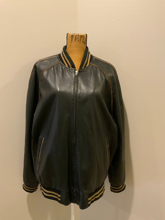 Kingspier Vintage - Retreat circa early 2000’s black leather bomber jacket with light brown stripe detailing, front zipper, slash front pockets and two inside pockets. Size 44.