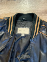 Load image into Gallery viewer, Kingspier Vintage - Retreat circa early 2000’s black leather bomber jacket with light brown stripe detailing, front zipper, slash front pockets and two inside pockets. Size 44.
