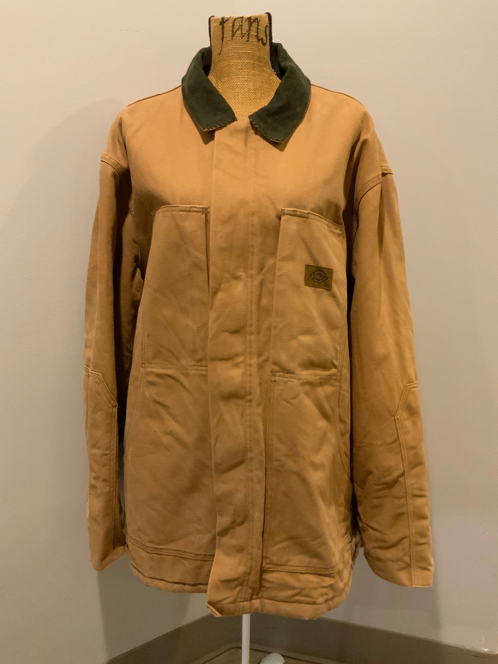 Kingspier Vintage - Dickies canvas work jacket with green corduroy collar, patch pockets, zipper, Velcro closures, quilted lining, an inside drawstring at the waist and an inside pocket. 