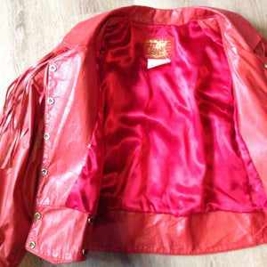 Kingspier Vintage - The Leather Ranch red fringe leather jacket with snap closures and red satin lining . Made in Canada, size XL.
