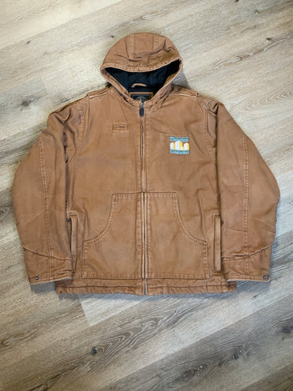 Kingspier Vintage - Charles River tan canvas work jacket with slash pockets, patch pockets, hood, “ timberline construction” embroidered emblem and quilted lining with inside pockets.