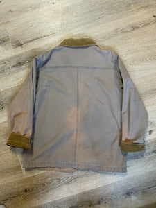 Kingspier Vintage - LL Bean distressed purple chore jacket with beige corduroy collar and cuffs, two slash pockets for keeping your hands warm, two flap pockets and button closures. Size petite Large.