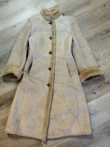 Kingspier Vintage - Montreal Leather Garment Sheepskin coat with shearling trim and lining, button closures and slash pockets.
