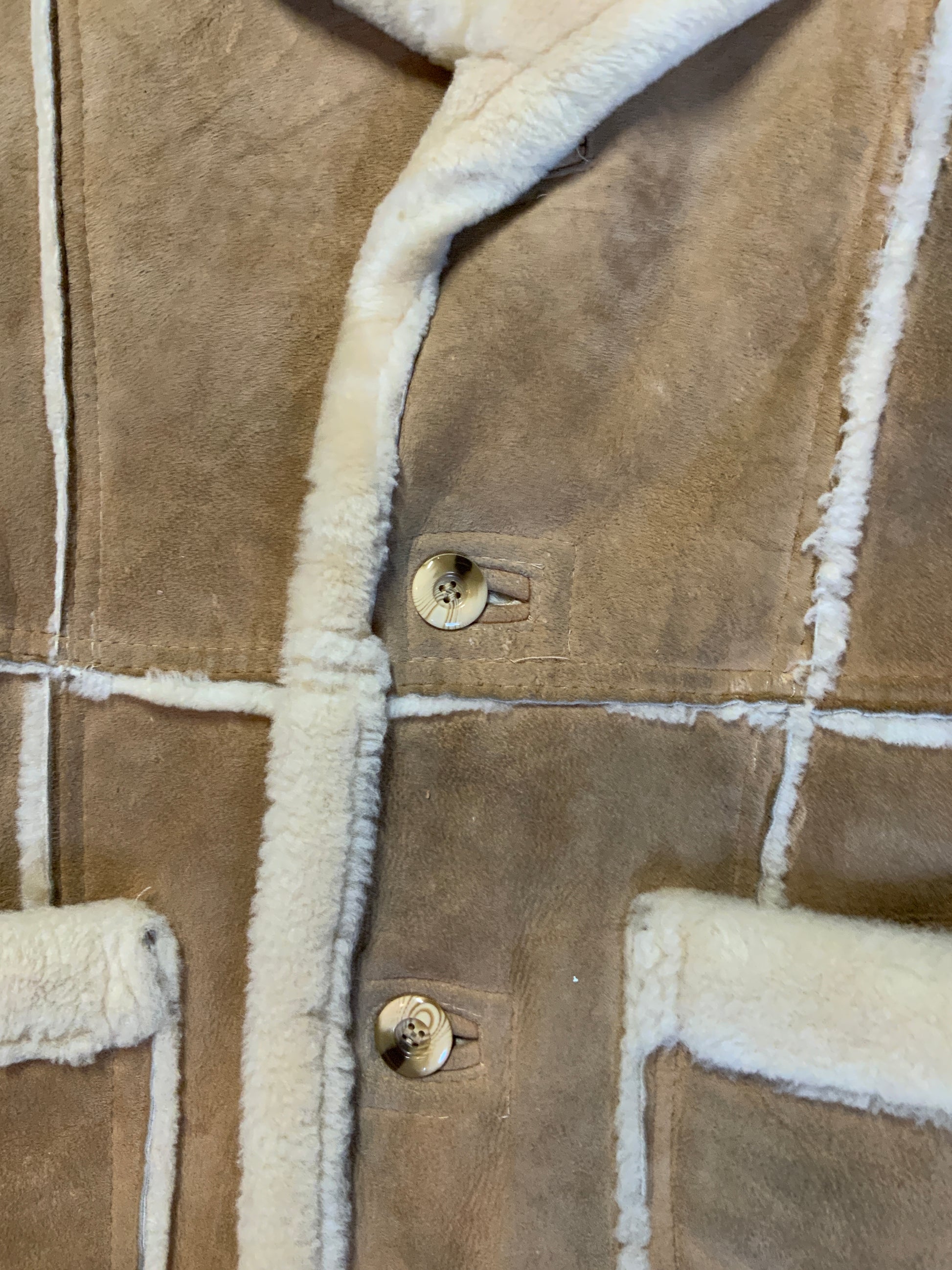 Kingspier Vintage - Leather Attic light brown sheepskin coat with shearling trim and lining, button closures and patch pockets.