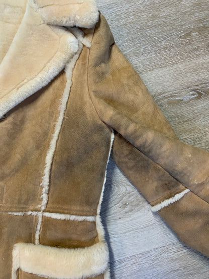 Kingspier Vintage - Leather Attic light brown sheepskin coat with shearling trim and lining, button closures and patch pockets.