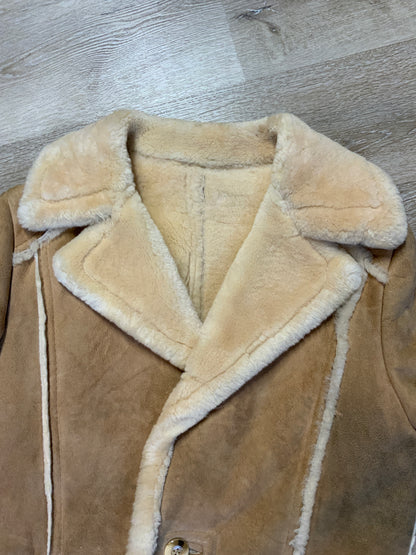 Kingspier Vintage - Leather Attic light brown sheepskin coat with shearling trim and lining, button closures and patch pockets.