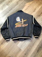Load image into Gallery viewer, Kingspier Vintage - Fat Cat by Jazz grey and black wool varsity jacket with two large custom Jazz Golf embroidered patches on the arm and the back and Molson is embroidered on the chest in black, leather sleeves and collar, pockets, snap closures, knit details and a quilted lining. Made in Canada by Mondetta . Size XL.
