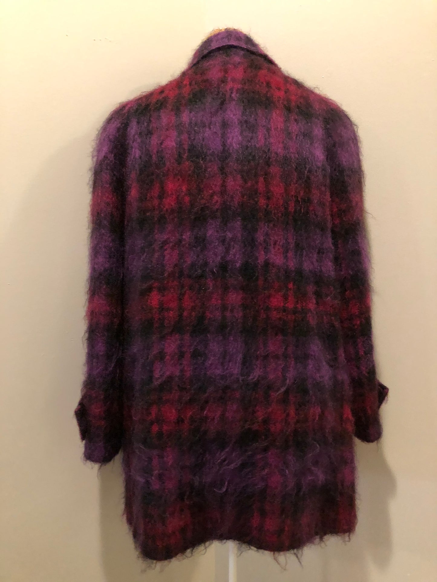 Kingspier Vintage - Fashion Gallery 1990’s Mohair/Wool blend purple and pink plaid jacket. This jacket features front welt pockets, four large iridescent purple buttons and black satin lining. Size 12.