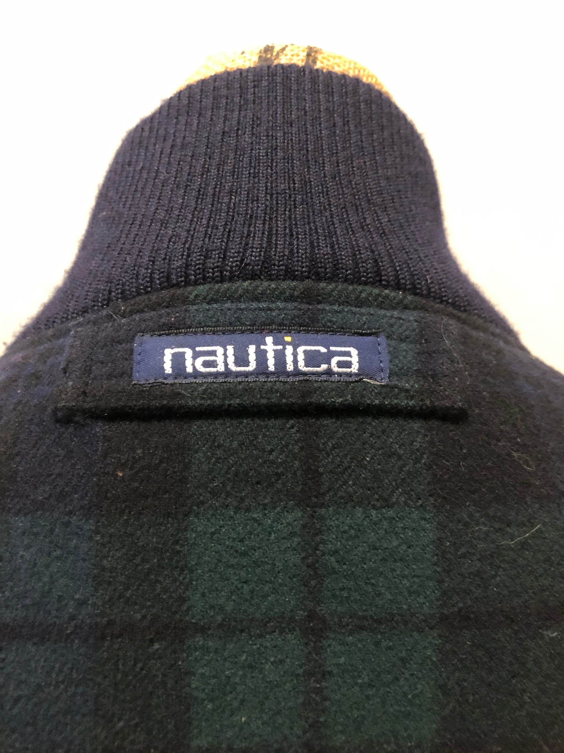 Kingspier Vintage - Nautica green and black “black watch” tartan wool jacket with knit trim collar, zipper, slash pockets and quilted lining. Size XL. 