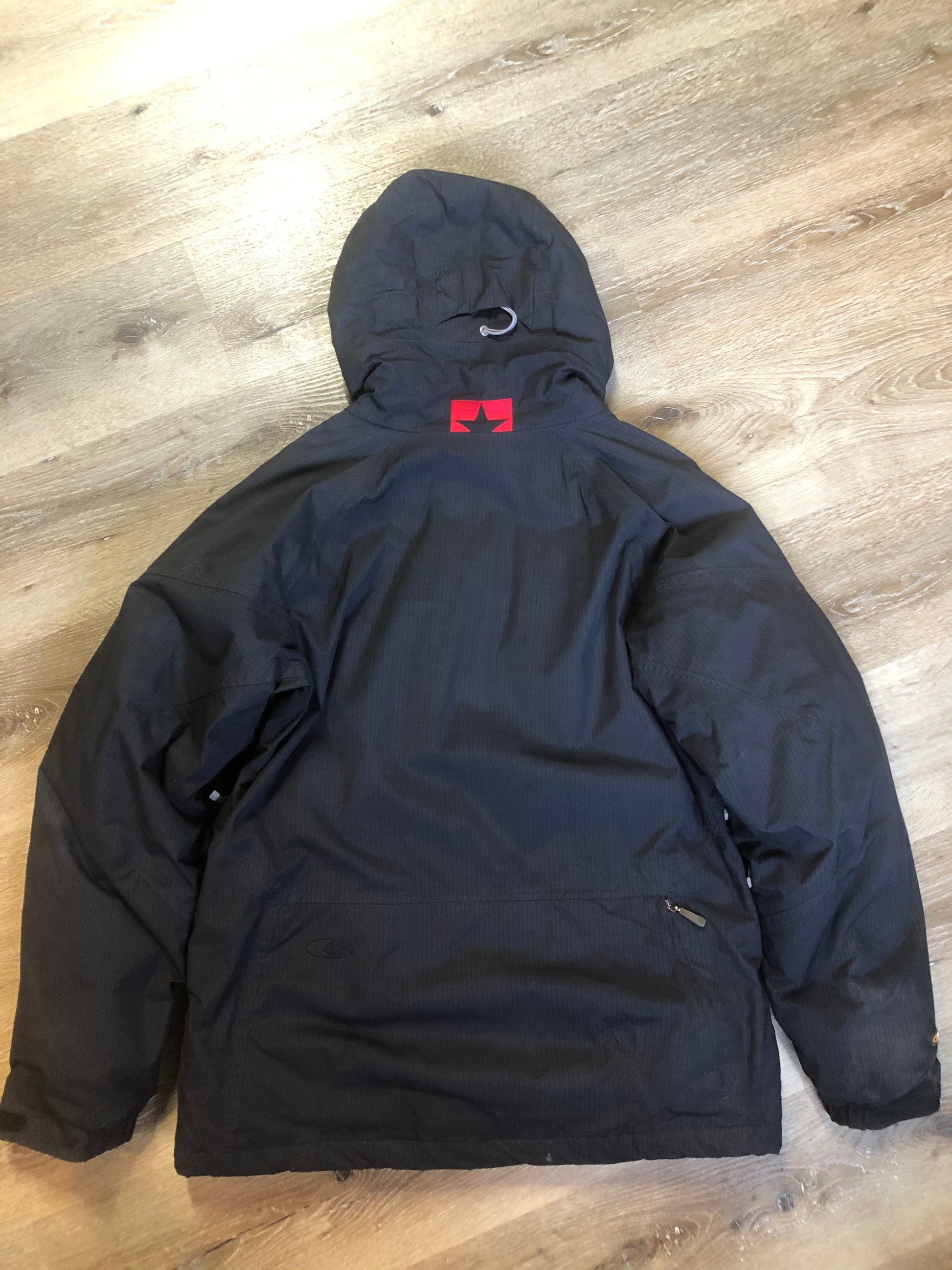 Kingspier Vintage - Bonfire “Triumph” black down filled, waterproof ski jacket with waterproof zippers,sling shot hood adjust, season pass window, many well thought out outside and inside pockets for headphone, phone, goggles, Etc. Size medium. 