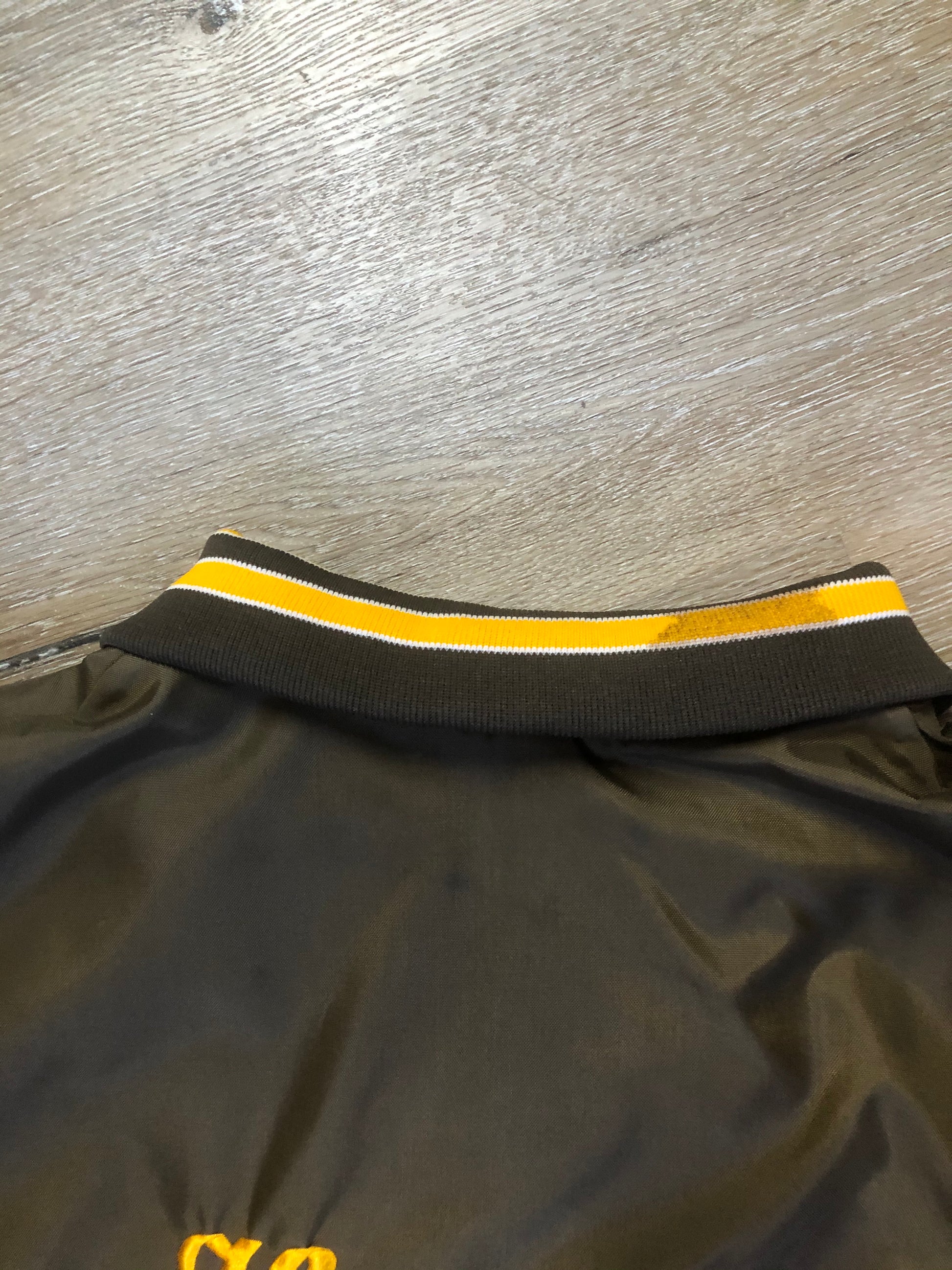 Kingspier Vintage - Havenhill High Soccer varsity jacket in brown with yellow stripe, zipper, front pouch pocket, “Havenhill High” written across the back and “Steph” monogram on the arm. Made in the USA. Size large. 