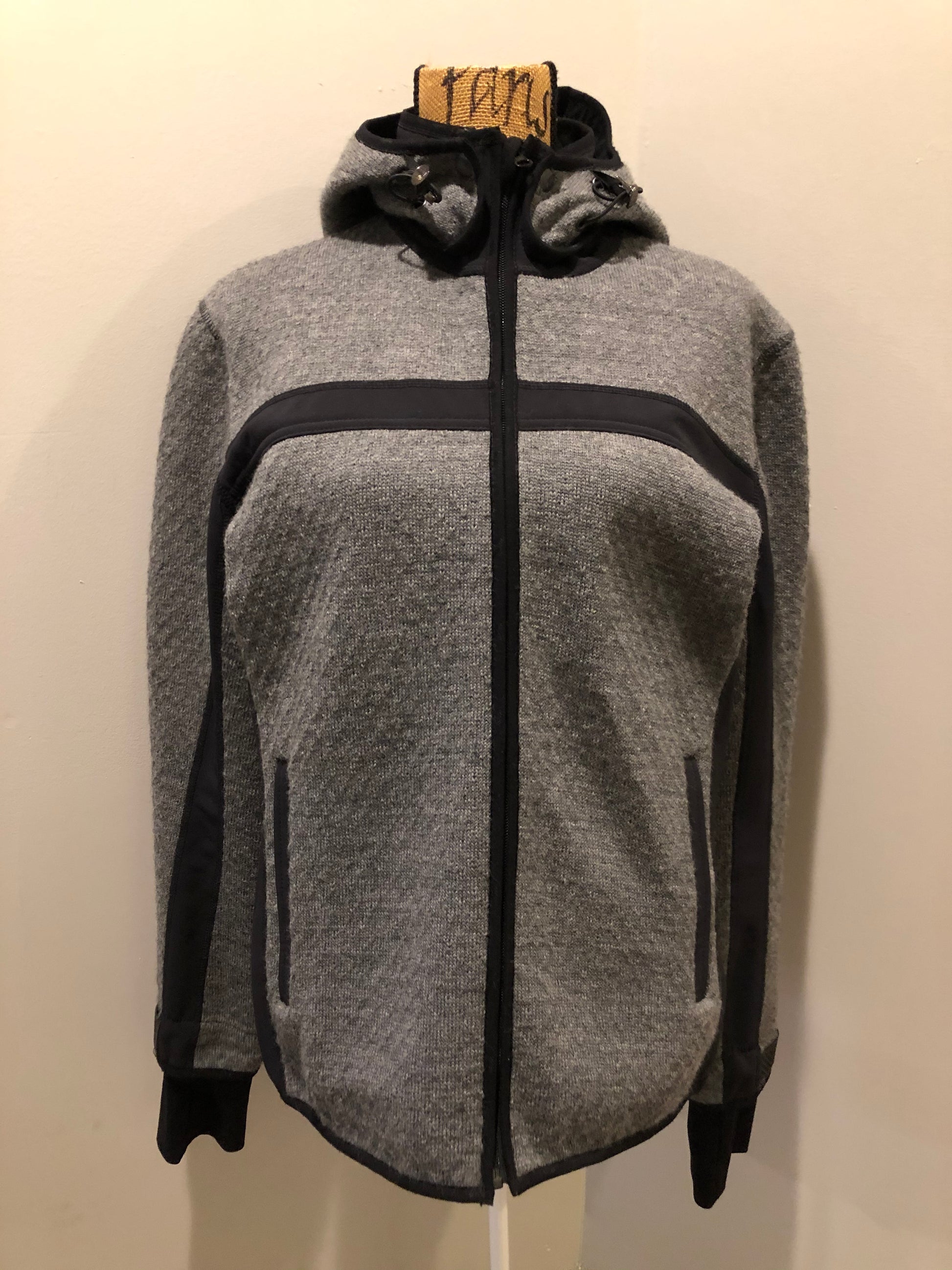 Kingspier Vintage - Dale of Norway weatherproof grey and black treated wool jacket with zipper, vertical pockets, thumb hole details, detachable hood and Dale of Norway crest on shoulder. 