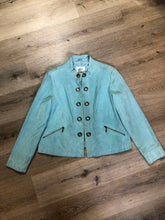 Load image into Gallery viewer, Kingspier Vintage - LAL “Live A LIttle” light teal suede jacket with hidden hook closures, brass grommets running down the front, two zip slash pockets and a small belt at the back. Size large.
