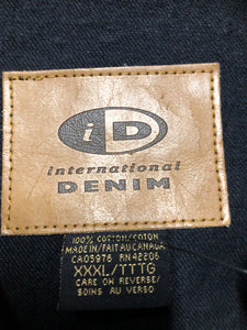 Kingspier Vintage - International Denim black denim jacket with button closures, two vertical pockets, two flap pockets and two inside pockets. Made in Canada. Size XXXL. 