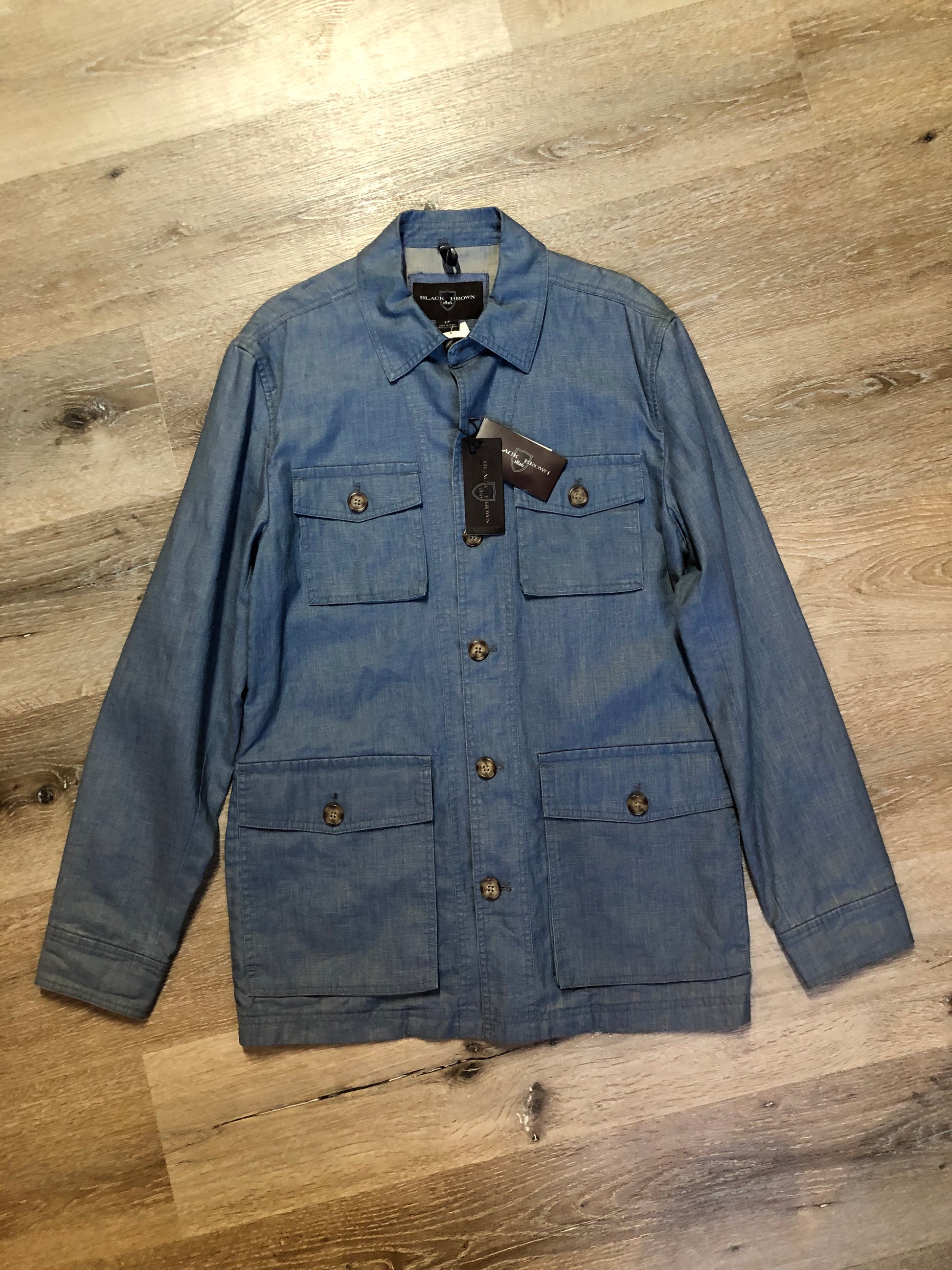 Kingspier Vintage - Black & Brown linen safari jacket in light blue with button closures and four flap pockets. Size small.