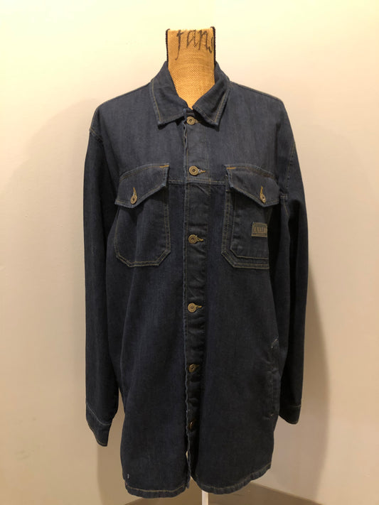 Kingspier Vintage - ATF (Analog Technical Fashion) denim jacket in a dark wash with button closures, two zip slash pockets, two flap pockets, an inside pocket and a plaid lining. Union made. Size XL. 