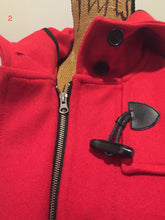 Load image into Gallery viewer, Kingspier Vintage - Hudson’s Bay Company official 2014 Olympics duffle coat in red with hood, toggles, zipper and flap pockets. Size is small.
