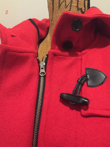 Kingspier Vintage - Hudson’s Bay Company official 2014 Olympics duffle coat in red with hood, toggles, zipper and flap pockets. Size is small.