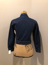 Load image into Gallery viewer, Kingspier Vintage - GWG (Great Western Garment Co.) denim jacket in a dark wash with button closures and two flap pockets on the chest. Says size 12 but fits XS.
