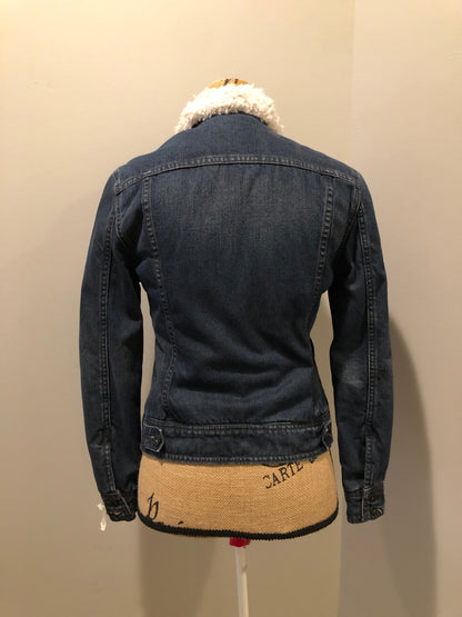 Kingspier Vintage - Levi’s denim Sherpa jacket in a faded dark wash with button closures, vertical pockets and flap pockets. Size small.