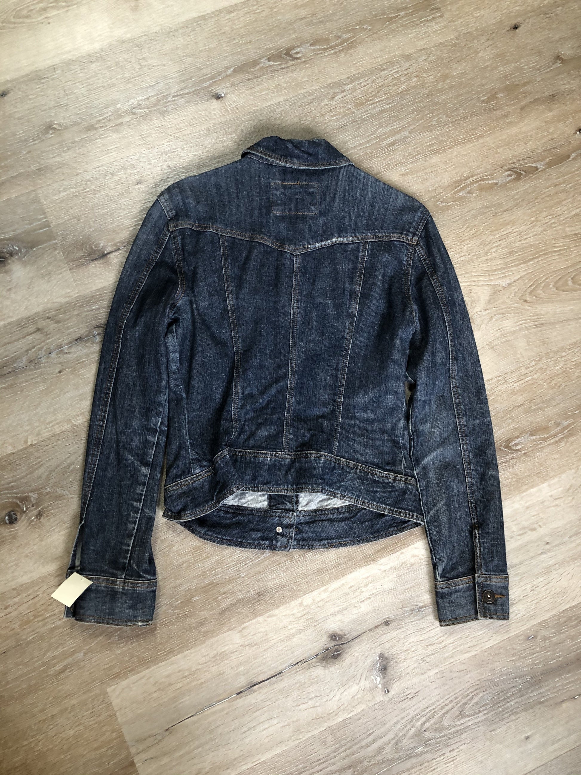 Kingspier Vintage - D Denim jacket in faded medium wash denim with whiskering on the sleeves, button closures and flap pockets on the chest. Size medium.