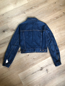 Kingspier Vintage - Levi’s denim jacket in a medium wash with button closures, hand warmer pockets, size medium.