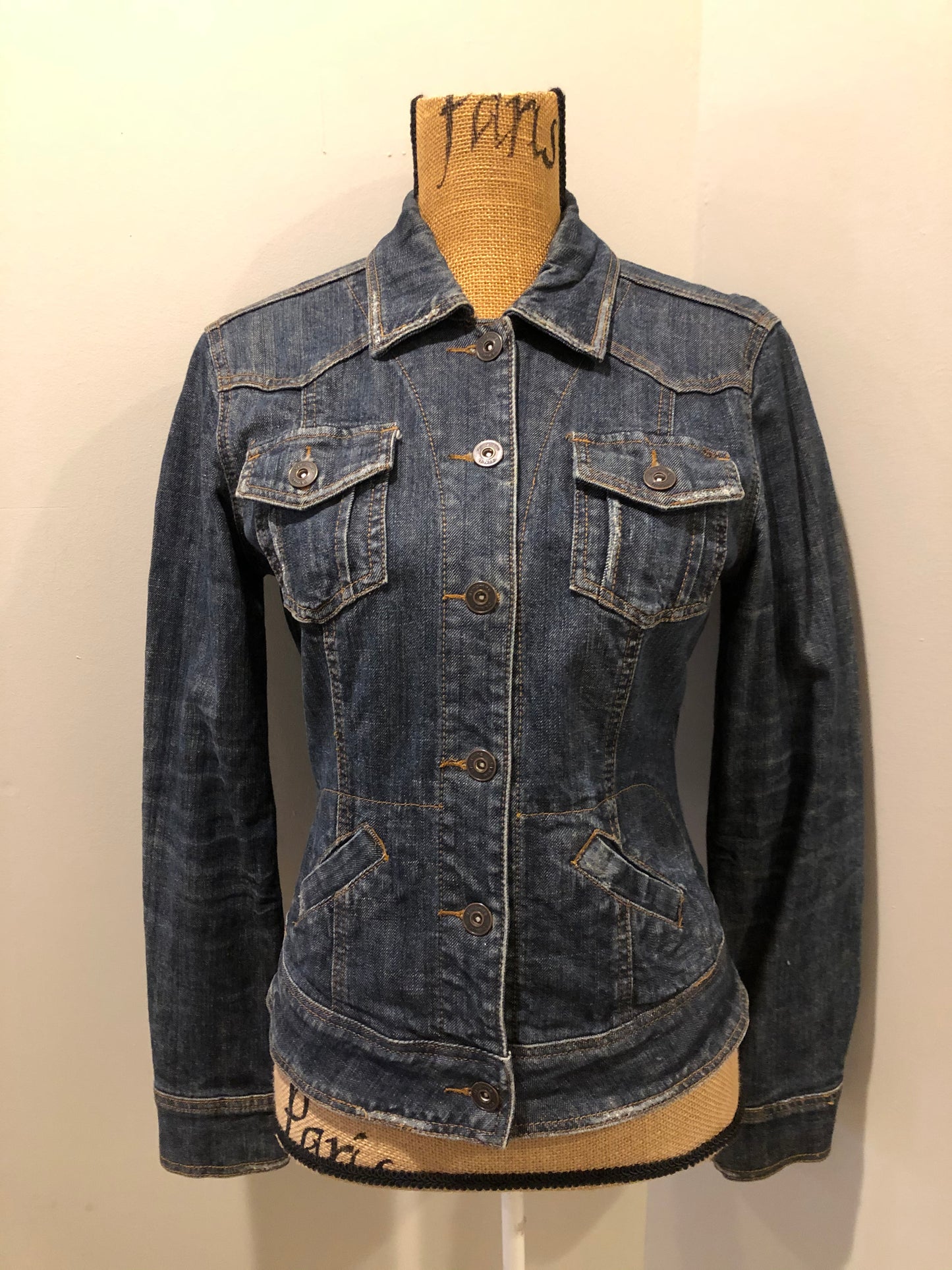 Kingspier Vintage - D Denim jacket in faded medium wash denim with whiskering on the sleeves, button closures and flap pockets on the chest. Size medium.