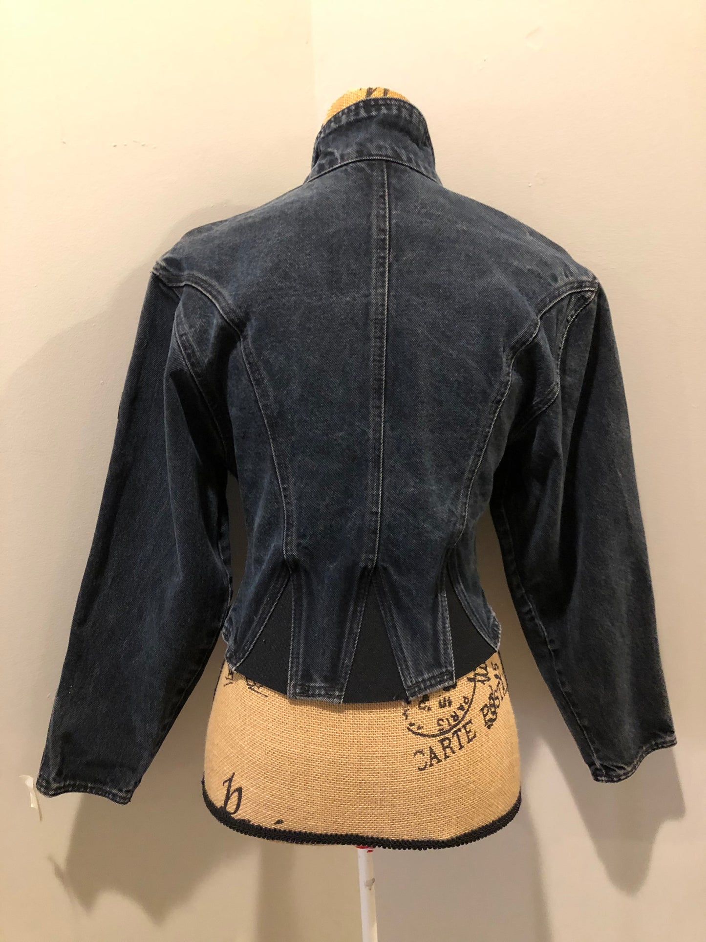 Kingspier Vintage - Santana denim jacket in faded black with elastic sections to hug the body, zipper and zip vertical pockets. Made in Canada. Size medium