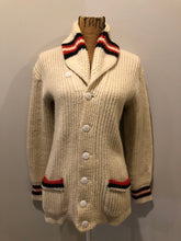 Load image into Gallery viewer, Kingspier Vintage - Curl-Rite by Rice-Knit Sportswear 1950’s curing sweater in cream with red and black strip details, shawl collar, button closures and pockets. 100% wool. Size medium. Made in Nova Scotia. 
