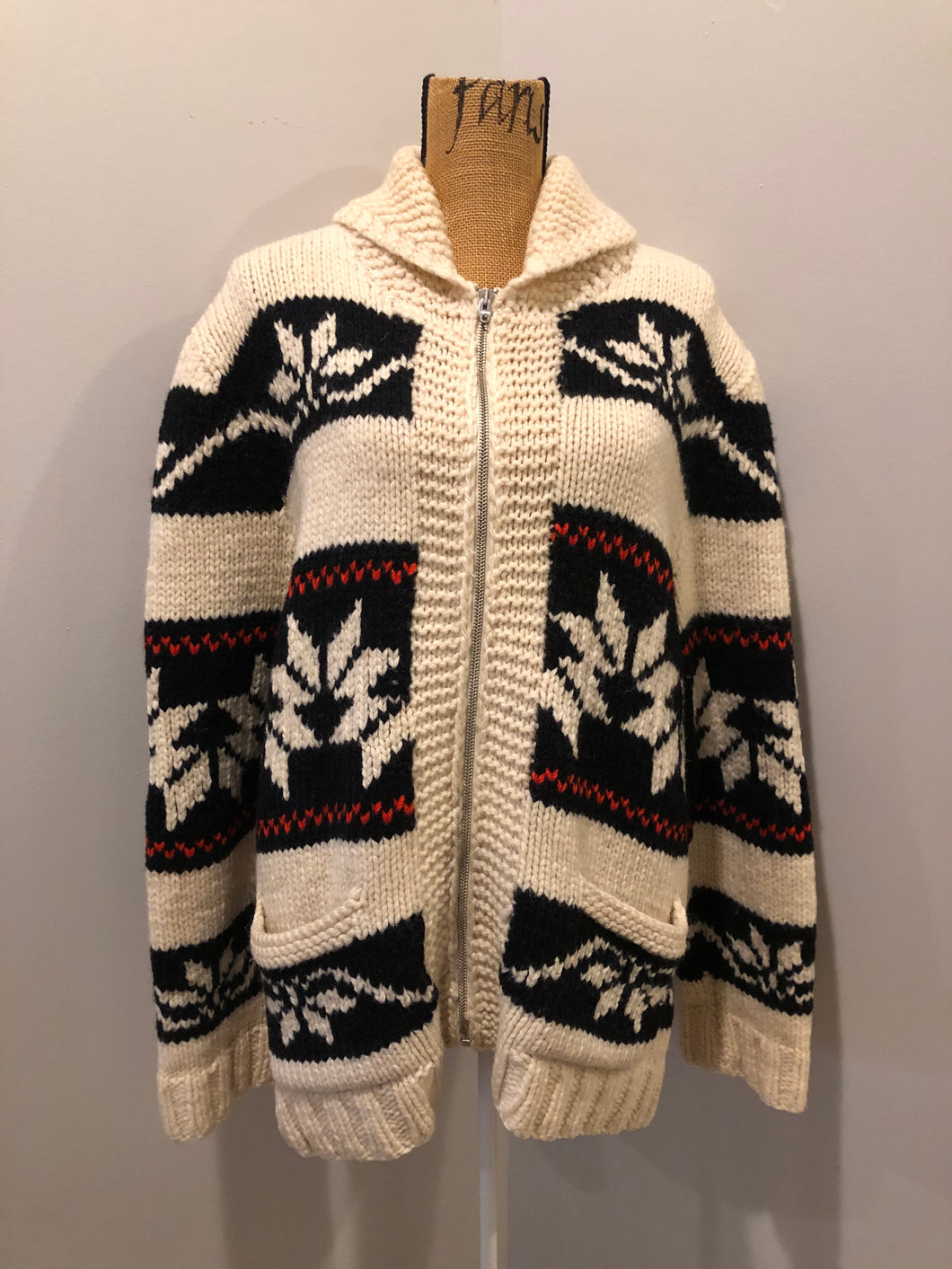 Kingspier Vintage - Cowichan hand spun, hand knit wool cardigan in cream, black and red with floral design, zipper and pockets. Size large.