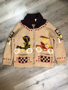 Kingspier Vintage - Mary Maxim hand knit wool zip cardigan in light brown with dark brown, red, yellow and cream with antique car design, raglan sleeves, zipper and pockets. Made in Nova Scotia.
