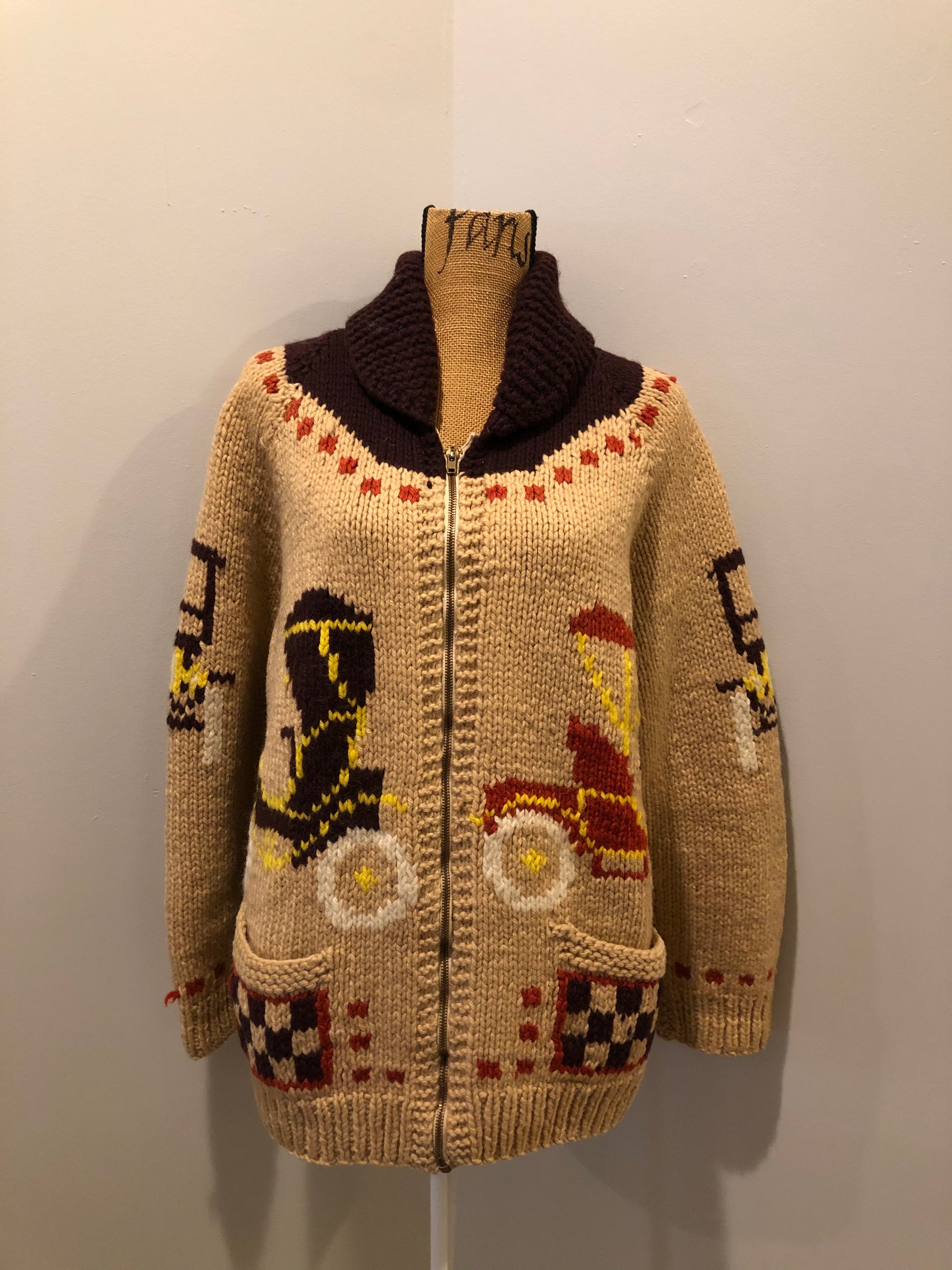 Kingspier Vintage - Mary Maxim hand knit wool zip cardigan in light brown with dark brown, red, yellow and cream with antique car design, raglan sleeves, zipper and pockets. Made in Nova Scotia.