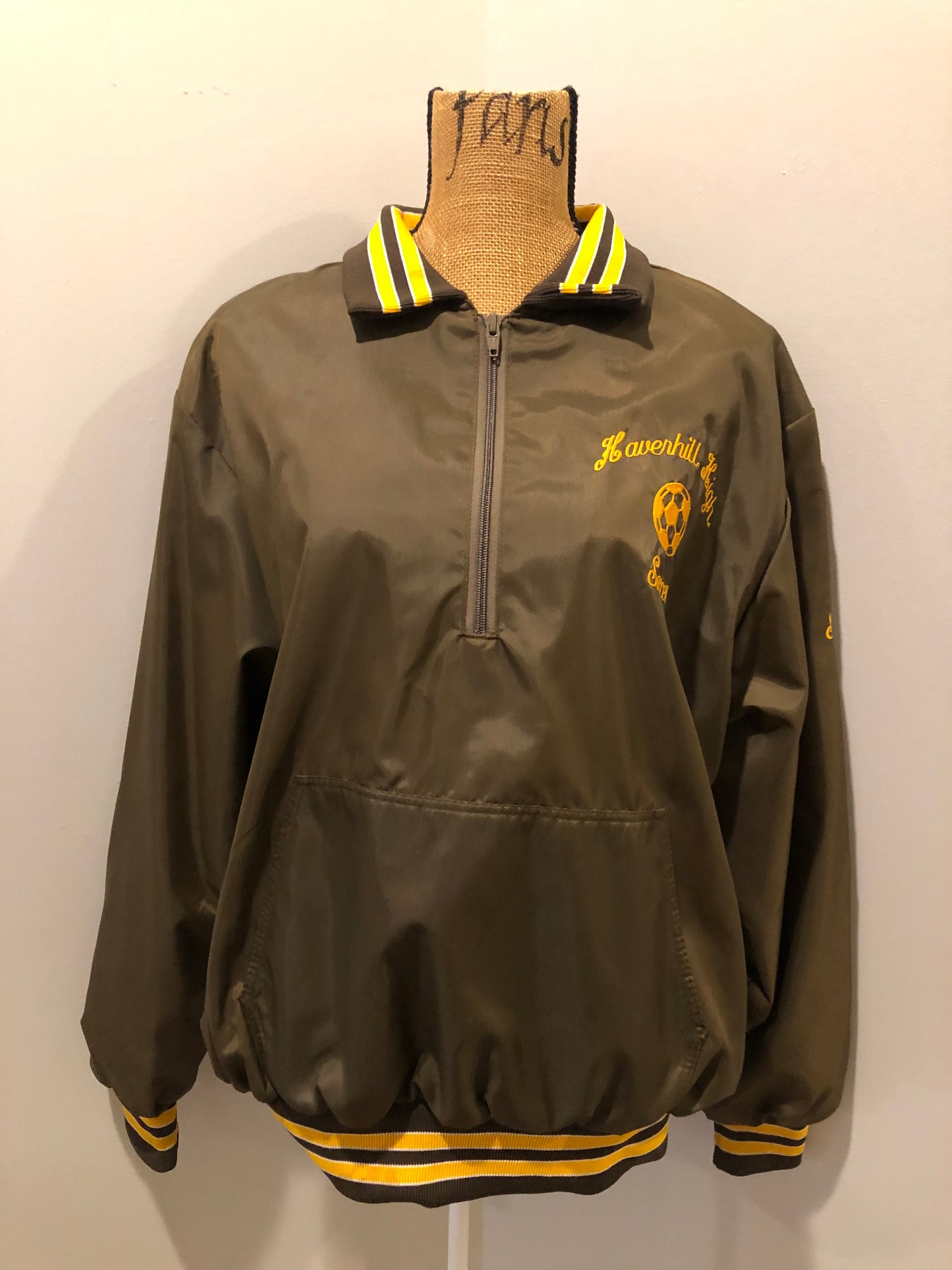 Kingspier Vintage - Havenhill High Soccer varsity jacket in brown with yellow stripe, zipper, front pouch pocket, “Havenhill High” written across the back and “Steph” monogram on the arm. Made in the USA. Size large. 