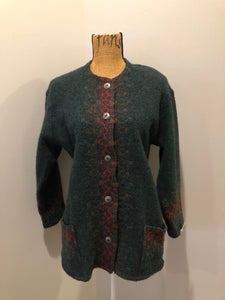 Kingspier Vintage - Deweevers wovens 100% wool cardigan in deep green with red design woven in, patch pockets and silver buttons with floral design. Made in Aylesford, NS. Size medium.