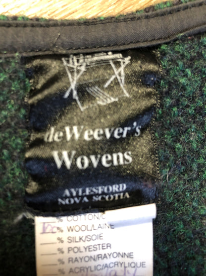 Kingspier Vintage - Deweevers wovens 100% wool cardigan in deep green with red design woven in, patch pockets and silver buttons with floral design. Made in Aylesford, NS. Size medium.