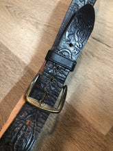 Load image into Gallery viewer, Kingspier Vintage - Vintage Noma Leather black full grain leather firefighter belt with brass buckle and embossed illustration of the evolution of the fire truck from 1922-1984. Made in Canada
