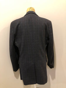 Kingspier Vintage - Chaps by Ralph Lauren slate grey with blue and red subtle stripe 100% wool jacket. This jacket is a two button, notch lapel with two flap pockets, a breast pocket and three inside pockets. Made in Canada.