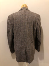 Load image into Gallery viewer, Kingspier Vintage - Paul Henry grey herringbone with flecks blue and rust 100% wool tweed jacket. This jacket is a two button, notch lapel with two flap pockets, a breast pocket and three inside pockets. Made in Europe.
