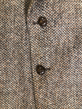 Load image into Gallery viewer, Kingspier Vintage - Harris Tweed beige with rust and grey flecks 100% wool tweed jacket. This jacket is a two button, notch lapel with two flap pockets, a breast pocket and two inside pockets. Made in Canada. Size 42R.
