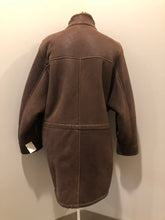 Load image into Gallery viewer, Kingspier Vintage - Jean Claude Poitras medium brown shearling coat. This coat features a speckled texture, shearling lining, zipper and snap closures, one zip pocket on the chest and two welt pockets. Size medium.
