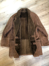 Load image into Gallery viewer, Kingspier Vintage - Hide Society medium brown shearling coat This coat features shearling lining, button closures, pockets and one inside zip pocket. Made in Canada. Size 10.
