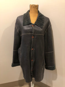 Kingspier Vintage - Reilly Olmes espresso brown coat with grey/ green shearling trim and lining, button closures and vertical pockets. Made in Argentina. Size large.