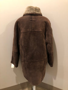 Kingspier Vintage - Positano Pelle dark brown shearling coat. This coat features shearling trim and lining, shall collar, wooden button closures and patch pockets. Made in Turkey. Size small.