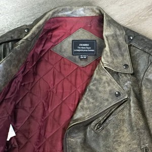 Kingspier Vintage - Sears distressed brown leather motorcycle jacket with zipper, two vertical zip pockets, one flap pocket and a slash pocket on the chest, a belt at the waist and red quilted lining. Size medium.