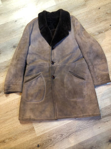 Kingspier Vintage - Medium brown suede coat with shearling trim and lining, button closures and patch pockets.