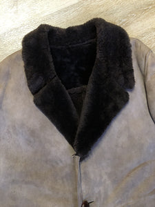 Kingspier Vintage - Medium brown suede coat with shearling trim and lining, button closures and patch pockets.