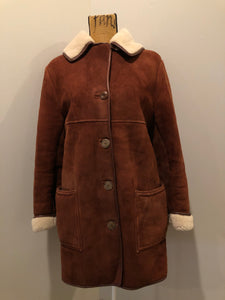 Kingspier Vintage - Antartex rust coloured suede sheepskin coat with shearling trim and lining, button closures and patch pockets. Made in Scotland. Size 10.