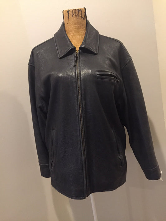 Kingspier Vintage - Roots black pebbled leather jacket with two vertical zip pockets and one zip pocket on the chest. Made in Canada. Size medium.