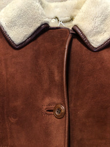 Kingspier Vintage - Antartex rust coloured suede sheepskin coat with shearling trim and lining, button closures and patch pockets. Made in Scotland. Size 10.