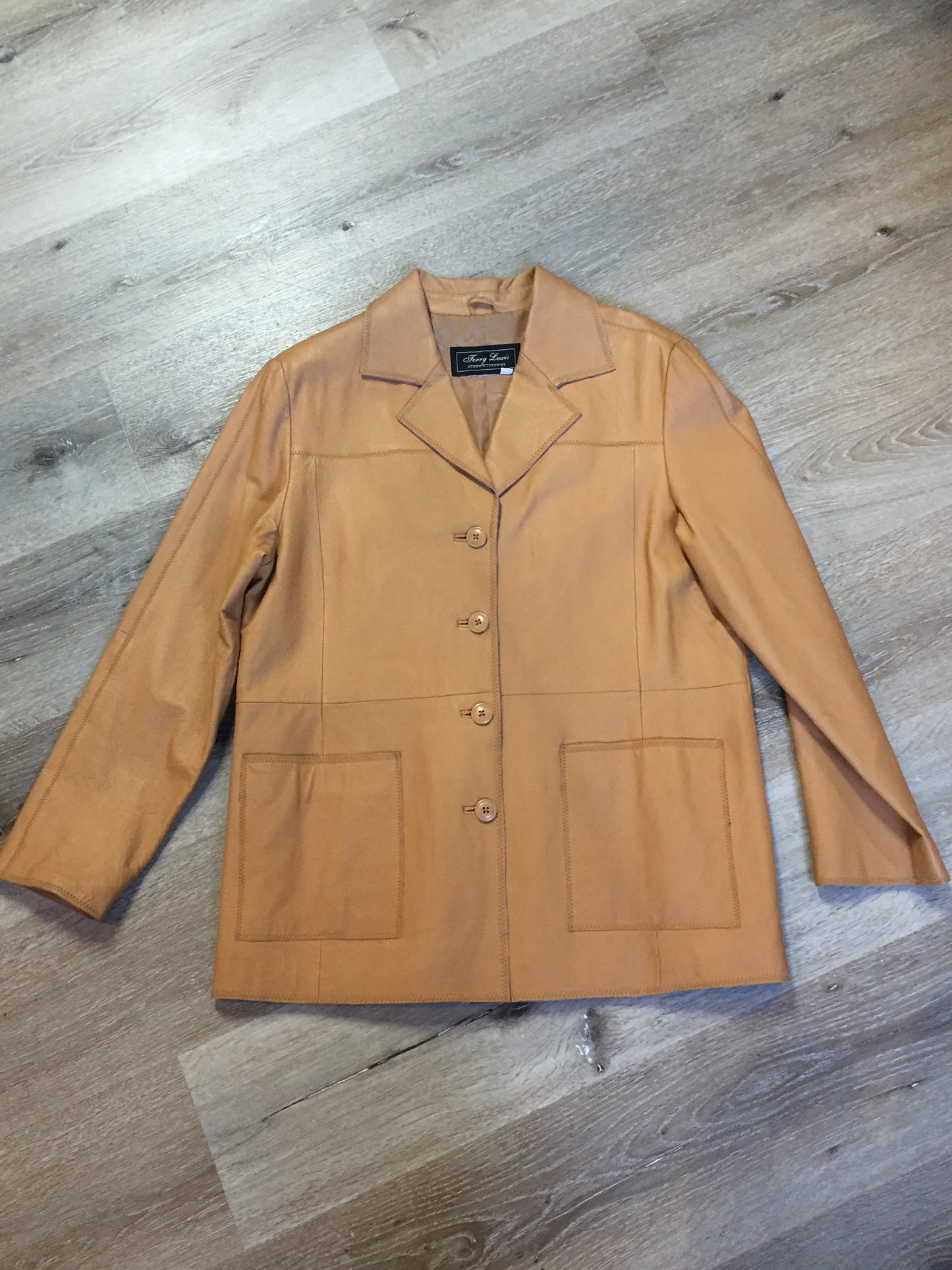 Kingspier Vintage - Jerry Lewis tan leather jacket with button closures and patch pockets. Size medium.